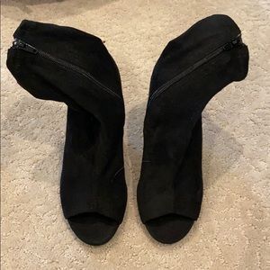 Black slip bootie. Never worn. size 7